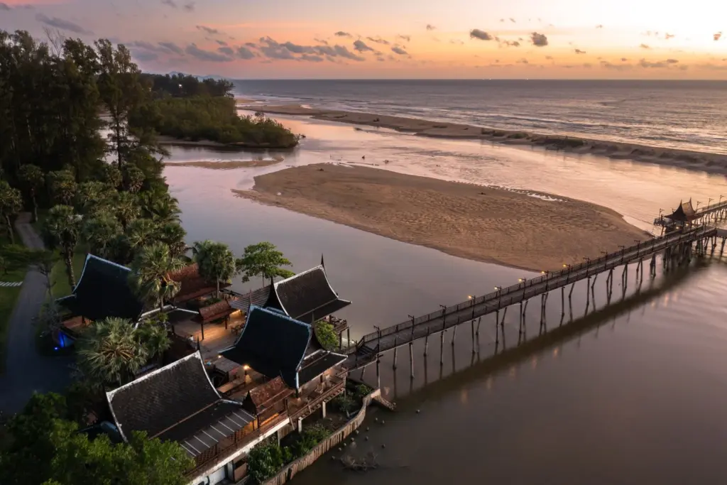 Sunset over Natai Beach and the waterfront at The Hotspring Beach Resort & Spa