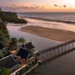 Sunset over Natai Beach and the waterfront at The Hotspring Beach Resort & Spa